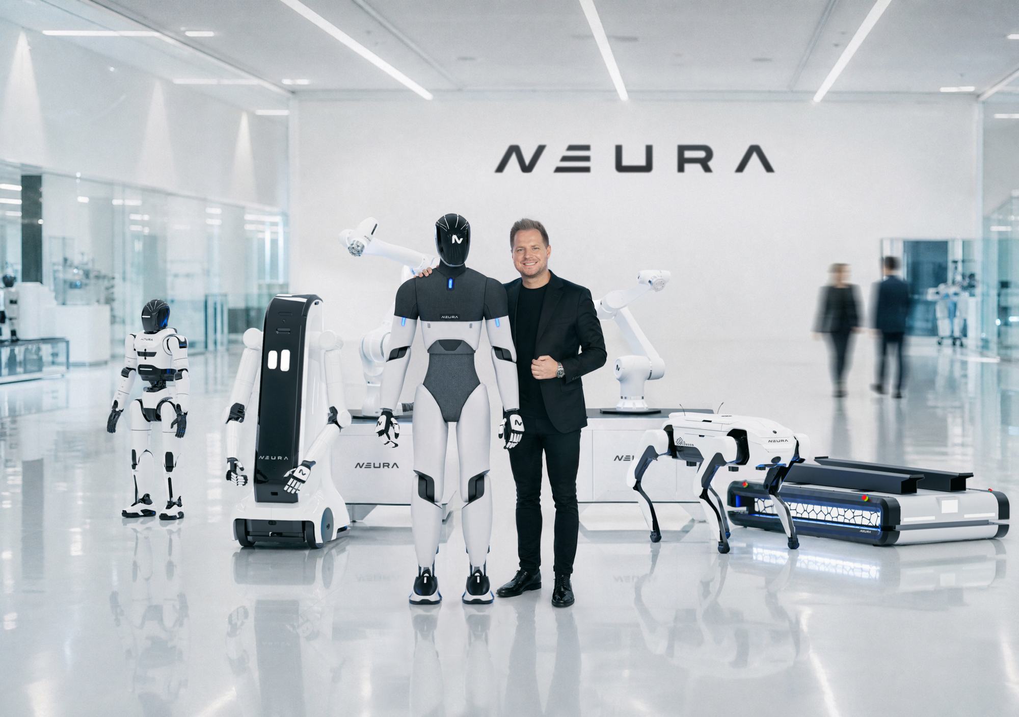 Neura-CEO David Reger (Mitte, mit schwarzem Anzug :-)